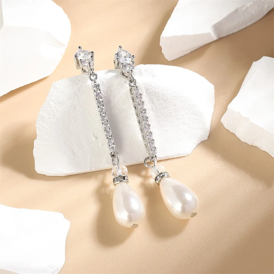 ZAKOL Elegantné Biele Imitácie Perál Drop Náušnice pre Ženy Jemné Lesklé CZ Zirkón Dlhé Náušnice Svadobné Svadobné Šperky